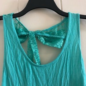 Bright blue top with lace bow